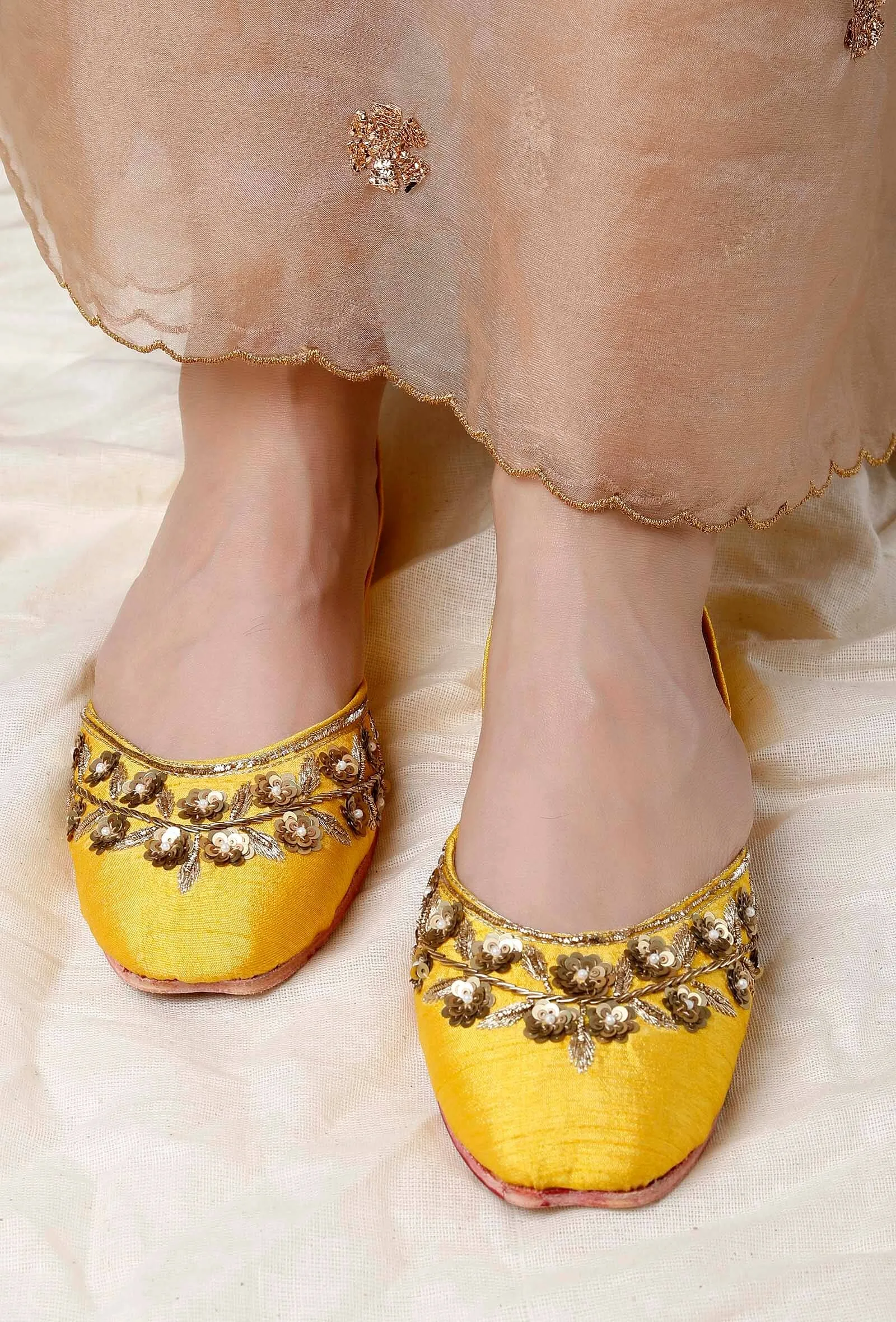 Yellow Hand Embroidered Silk Juttis